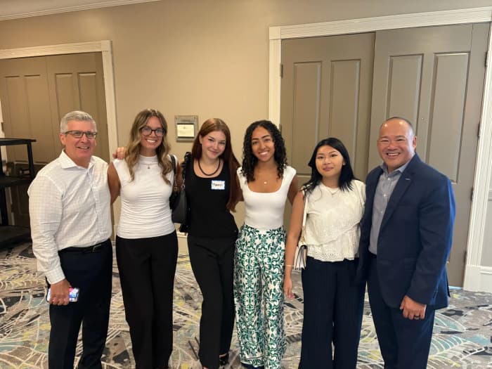 AIN Hub team with Chamber President John Lai